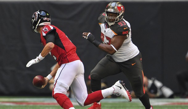 Oct 14, 2018; Atlanta, GA, USA; Atlanta Falcons quarterback Matt Ryan (2) runs with the ball as Tampa Bay Buccaneers defensive tackle Gerald McCoy (93) chases during the first half at Mercedes-Benz Stadium. Photo Credit: Dale Zanine-USA TODAY Sports