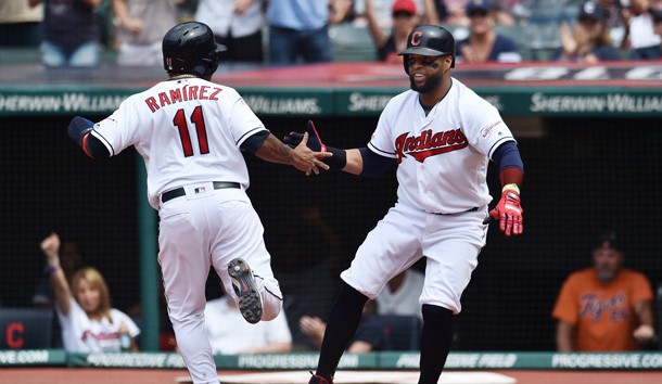 Jun 23, 2019; Cleveland, OH, USA; Cleveland Indians third baseman Jose Ramirez (11) and designated hitter Carlos Santana (41) celebrate after scoring during the eighth inning at Progressive Field. Photo Credit: Ken Blaze-USA TODAY Sports
