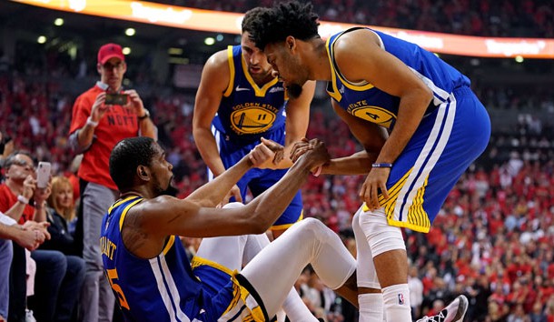 Jun 10, 2019; Toronto, Ontario, CAN; Golden State Warriors forward Kevin Durant (35) is helped up by guard Quinn Cook (4) and guard Klay Thompson (11) after an apparent injury during the second quarter in game five of the 2019 NBA Finals against the Toronto Raptors at Scotiabank Arena. Photo Credit: Kyle Terada-USA TODAY Sports
