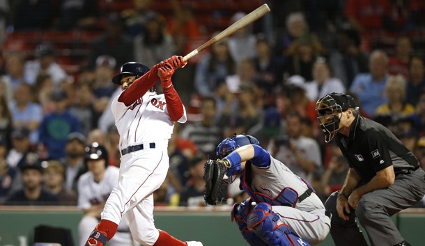 Jun 11, 2019; Boston, MA, USA; Boston Red Sox right fielder Mookie Betts (50) hits a solo home run against the Texas Rangers during the ninth inning at Fenway Park. Photo Credit: Greg M. Cooper-USA TODAY Sports