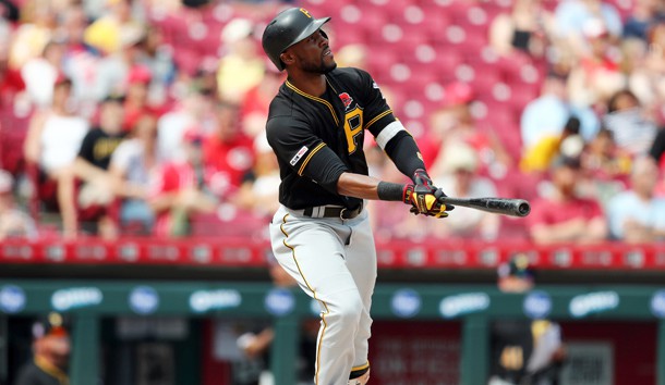 May 27, 2019; Cincinnati, OH, USA; Pittsburgh Pirates center fielder Starling Marte (6) hits a two-run home run against the Cincinnati Reds in the eighth inning at Great American Ball Park. Photo Credit: Aaron Doster-USA TODAY Sports