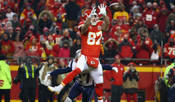 Jan 20, 2019; Kansas City, MO, USA; Kansas City Chiefs tight end Travis Kelce (87) catches the ball in front of New England Patriots defensive back J.C. Jackson (27) during the second half of the AFC Championship game at Arrowhead Stadium. Photo Credit: Jay Biggerstaff-USA TODAY Sports