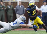 Robinson leads Michigan to win over Air Force