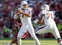 Behind Hill's school-record passing, Aggies roll