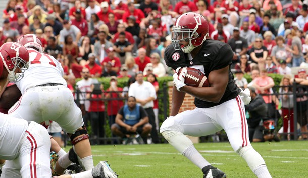 Apr 18, 2015; Tuscaloosa, AL, USA; Alabama Crimson Tide running back Kenyan Drake (17) carries the ball for the Crimson team during the annual A-Day game at Bryant Denny Stadium. (Marvin Gentry-USA TODAY Sports)