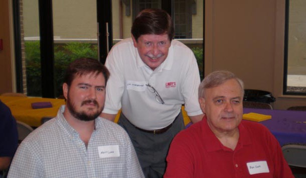 Ben Cook (right) with Lindy's staff members Matt Lowe (left) and Lyn Scarbrough (middle) at an LSU Alumni Kickoff event. 