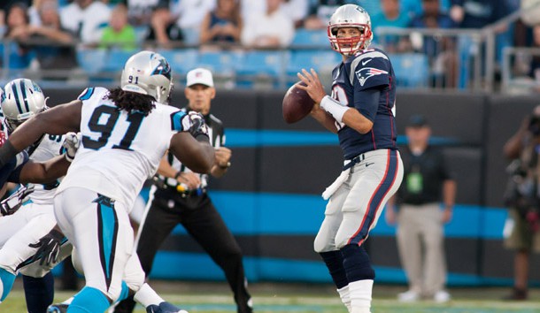 Aug 28, 2015; Charlotte, NC, USA; New England Patriots quarterback Tom Brady (12) looks to pass the ball during the first quarter against the Carolina Panthers at Bank of America Stadium. (Jeremy Brevard-USA TODAY Sports)