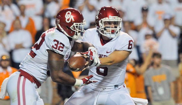 Sep 12, 2015; Knoxville, TN, USA; Oklahoma Sooners quarterback Baker Mayfield (6) hands off to running back Samaje Perine (32) during the second half against the Tennessee Volunteers at Neyland Stadium. Oklahoma won 31-24. Mandatory Credit: Jim Brown-USA TODAY Sports