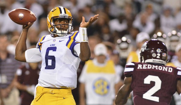 Sep 12, 2015; Starkville, MS, USA; LSU Tigers quarterback Brandon Harris (6) drops back to pass under pressure from Mississippi State Bulldogs defensive back Will Redmond (2) during the 2nd quarter at Davis Wade Stadium. Mandatory Credit: Matt Bush-USA TODAY Sports