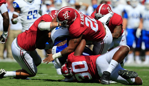 Sep 12, 2015; Tuscaloosa, AL, USA;  Alabama Crimson Tide linebacker Denzel Devall (30) and linebacker Ryan Anderson (22) wrap up Middle Tennessee Blue Raiders running back Shane Tucker (1) during the first quarter at Bryant-Denny Stadium. Mandatory Credit: Marvin Gentry-USA TODAY Sports