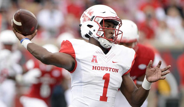 Sep 12, 2015; Louisville, KY, USA; Houston Cougars quarterback Greg Ward Jr. (1) looks to pass the ball against the Louisville Cardinals during second half at Papa John's Cardinal Stadium. Houston defeated Louisville 34-31.  Mandatory Credit: Jamie Rhodes-USA TODAY Sports
