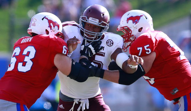 Defensive end Myles Garrett (15) is a load for offensive linemen to handle. Tim Heitman-USA TODAY Sports