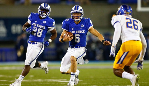 Sep 12, 2015; Colorado Springs, CO, USA; Air Force Falcons quarterback Nate Romine (6) runs the ball against San Jose State Spartans safety Vincente Miles Jr (26) in front of Falcons running back Jacobi Owens (28) in the second quarter at Falcon Stadium. Mandatory Credit: Isaiah J. Downing-USA TODAY Sports