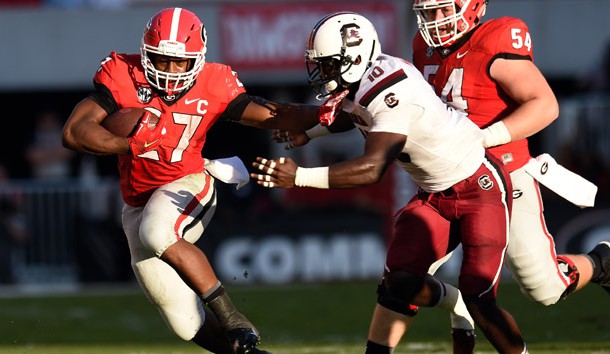 Sep 19, 2015; Athens, GA, USA; Georgia Bulldogs running back Nick Chubb (27) runs against South Carolina Gamecocks linebacker Skai Moore (10) during the first half at Sanford Stadium. Mandatory Credit: Dale Zanine-USA TODAY Sports