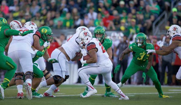 Sep 26, 2015; Eugene, OR, USA; Oregon Ducks defensive lineman DeForest Buckner (44) and Oregon Ducks linebacker Christian French (96) rush Utah Utes wide receiver Kenric Young (24) as he runs the ball at Autzen Stadium. Mandatory Credit: Scott Olmos-USA TODAY Sports