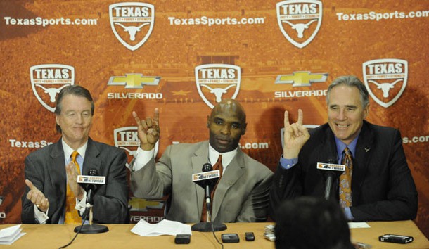 Jan 6, 2014; Austin, TX, USA; Texas Longhorns president Bill Powers (left) and head football coach Charlie Strong (center) and athletics director Steve Patterson (right) speak at a press conference in the Centennial Room of Belmont Hall at Texas-Memorial Stadium. Mandatory Credit: Brendan Maloney-USA TODAY Sports