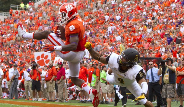 Sep 12, 2015; Clemson, SC, USA; Clemson Tigers wide receiver Artavis Scott (3) scores a touchdown while being defended by Appalachian State Mountaineers defensive back Mondo Williams (4) during the second half at Clemson Memorial Stadium. Mandatory Credit: Joshua S. Kelly-USA TODAY Sports