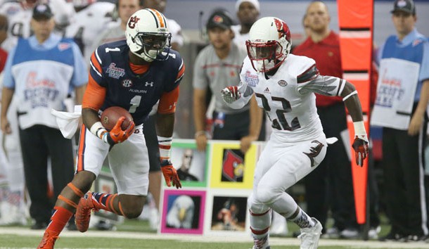 Sep 5, 2015; Atlanta, GA, USA; Auburn Tigers wide receiver D'haquille Williams (1) runs with the ball chased by Louisville Cardinals safety Chucky Williams (22) during the second quarter in the 2015 Chick-fil-A Kickoff Game at the Georgia Dome. Mandatory Credit: Jason Getz-USA TODAY Sports