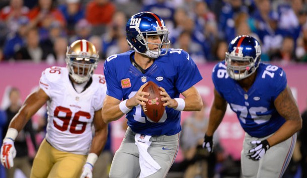 Oct 11, 2015; East Rutherford, NJ, USA; New York Giants quarterback Eli Manning (10) prepares to throw the ball in the first quarter against the San Francisco 49ers at MetLife Stadium. Mandatory Credit: Robert Deutsch-USA TODAY Sports