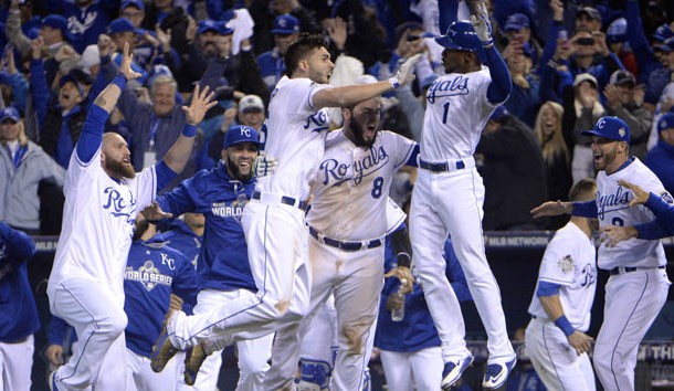 Oct 27, 2015; Kansas City, MO, USA; Kansas City Royals first baseman Eric Hosmer (35) is congratulated by teammates after driving in the winning run with a sacrifice fly against the New York Mets in the 14th inning in game one of the 2015 World Series at Kauffman Stadium. Mandatory Credit: John Rieger-USA TODAY Sports