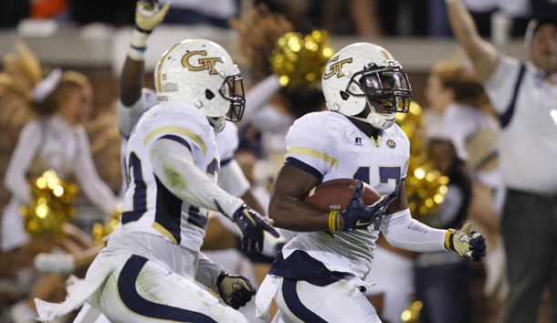 Oct 24, 2015; Atlanta, GA, USA; Georgia Tech Yellow Jackets defensive back Lance Austin (17) returns a blocked kick for a game winning touchdown against the Florida State Seminoles in the fourth quarter at Bobby Dodd Stadium. Georgia Tech defeated Florida State 22-16. Mandatory Credit: Brett Davis-USA TODAY Sports