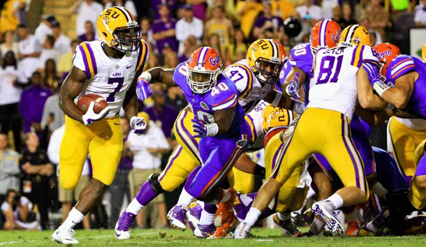 Oct 17, 2015; Baton Rouge, LA, USA; LSU Tigers running back Leonard Fournette (7) receives the snap from the shotgun and runs for a touchdown against the Florida Gators during the second quarter of a game at Tiger Stadium. Mandatory Credit: Derick E. Hingle-USA TODAY Sports