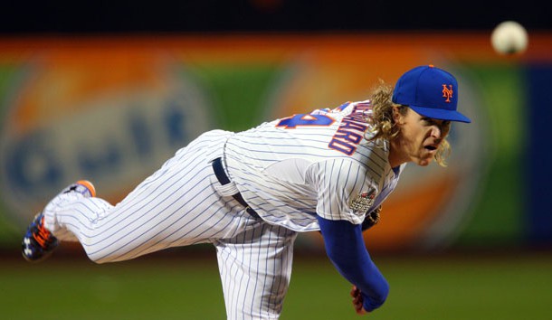 Oct 30, 2015; New York City, NY, USA; New York Mets starting pitcher Noah Syndergaard throws a pitch against the Kansas City Royals in the first inning in game three of the World Series at Citi Field. Mandatory Credit: Brad Penner-USA TODAY Sports