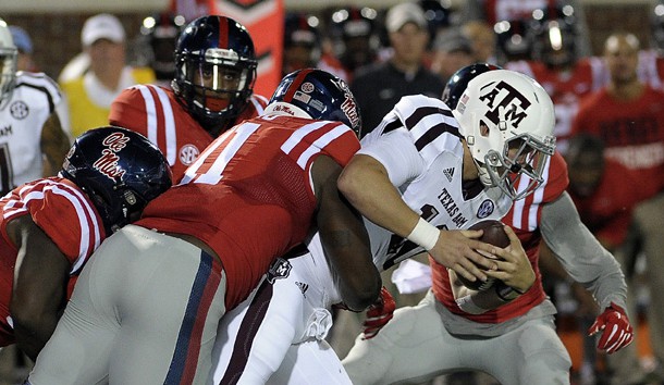 Oct 24, 2015; Oxford, MS, USA; Mississippi Rebels defensive end Channing Ward (11) tackles Texas A&M Aggies quarterback Kyle Allen (10) during the game at Vaught-Hemingway Stadium. Mandatory Credit: Justin Ford-USA TODAY Sports