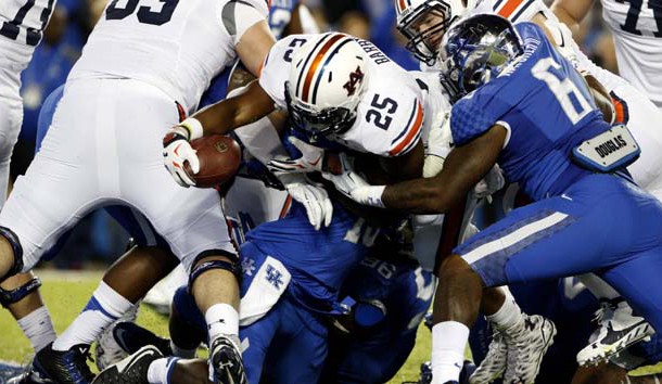 Oct 15, 2015; Lexington, KY, USA; Auburn Tigers running back Peyton Barber (25) dives for a touchdown against the Kentucky Wildcats in the second half at Commonwealth Stadium. Auburn defeated Kentucky 30-27. Mandatory Credit: Mark Zerof-USA TODAY Sports