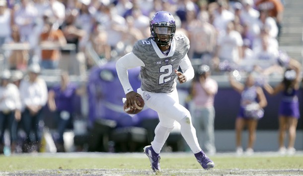 Oct 3, 2015; Fort Worth, TX, USA; Texas Christian University Horned Frogs quarterback Trevone Boykin (2) scrambles against the University of Texas Longhorns in the third quarter at Amon G. Carter Stadium. Mandatory Credit: Erich Schlegel-USA TODAY Sports