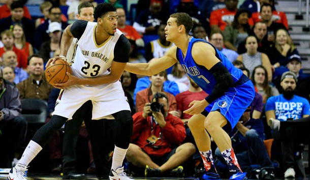 Nov 10, 2015; New Orleans, LA, USA; New Orleans Pelicans forward Anthony Davis (23) is guarded by Dallas Mavericks forward Dwight Powell (7) during the second quarter of a game at the Smoothie King Center. Mandatory Credit: Derick E. Hingle-USA TODAY Sports