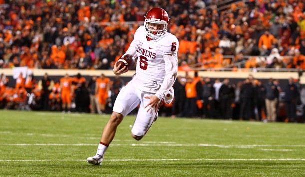 Nov 28, 2015; Stillwater, OK, USA; Oklahoma Sooners quarterback Baker Mayfield (6) runs the ball for a touchdown in the second half against the Oklahoma State Cowboys at Boone Pickens Stadium. The Sooners defeated the Cowboys 58-23. Mandatory Credit: Mark J. Rebilas-USA TODAY Sports