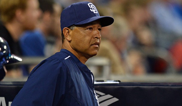 Jun 15, 2015; San Diego, CA, USA; San Diego Padres interim manager Dave Roberts (8) looks on during the seventh inning against the Oakland Athletics at Petco Park. Mandatory Credit: Jake Roth-USA TODAY Sports
