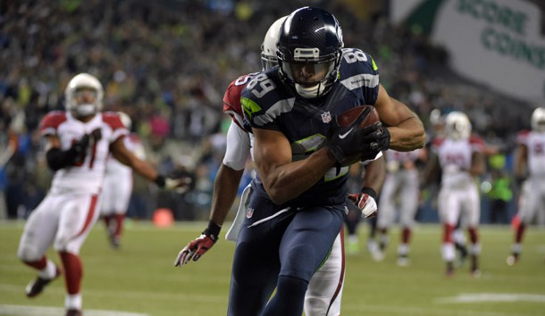 Nov 15, 2015; Seattle, WA, USA; Seattle Seahawks wide receiver Doug Baldwin (89) scores on a 32-yard touchdown reception in the third quarter against th e Arizona Cardinals during a NFL football game at CenturyLink Field. Mandatory Credit: Kirby Lee-USA TODAY Sports