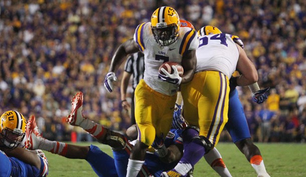 Oct 17, 2015; Baton Rouge, LA, USA; LSU Tigers running back Leonard Fournette (7) carries the ball against the Florida Gators during the second quarter at Tiger Stadium. Mandatory Credit: Crystal LoGiudice-USA TODAY Sports