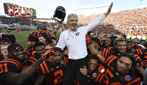 Nov 21, 2015; Blacksburg, VA, USA; Virginia Tech Hokies head coach Frank Beamer is carried off the field by his team after the game. The Tar Heels defeated the Hokies 30-27 in overtime at Lane Stadium. Mandatory Credit: Bob Donnan-USA TODAY Sports