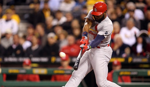 Sep 30, 2015; Pittsburgh, PA, USA; St. Louis Cardinals right fielder Jason Heyward (22) hits a grand slam home run against the Pittsburgh Pirates during the third inning at PNC Park. Mandatory Credit: Charles LeClaire-USA TODAY Sports