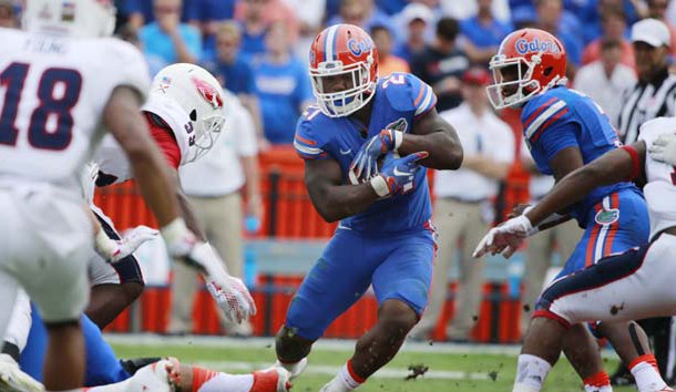 Nov 21, 2015; Gainesville, FL, USA; Florida Gators running back Kelvin Taylor (21) runs with the ball against the Florida Atlantic Owls during the first quarter at Ben Hill Griffin Stadium. Mandatory Credit: Kim Klement-USA TODAY Sports