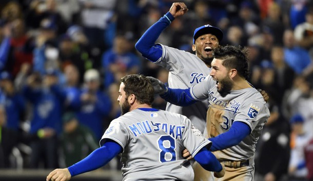 Nov 1, 2015; New York City, NY, USA; Kansas City Royals players Mike Moustakas (8) , Eric Hosmer (35) and Alcides Escobar (2) celebrate after defeating the New York Mets in game five of the World Series at Citi Field. The Royals won the World Series four games to one. Mandatory Credit: Robert Deutsch-USA TODAY Sports