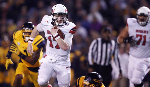 Nov 3, 2015; Toledo, OH, USA; Northern Illinois Huskies quarterback Ryan Graham (17) runs the ball against the Toledo Rockets during the fourth quarter at Glass Bowl. Huskies win 32-27. Mandatory Credit: Raj Mehta-USA TODAY Sports