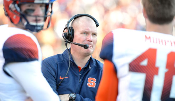 Nov 21, 2015; Raleigh, NC, USA; Syracuse Orange head coach Scott Shafer (center) watches a replay during the second half against the North Carolina State Wolfpack at Carter Finley Stadium.  North Carolina State won 42-29. Mandatory Credit: Rob Kinnan-USA TODAY Sports