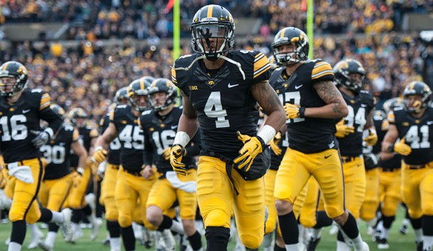 Oct 31, 2015; Iowa City, IA, USA; Iowa Hawkeyes wide receiver Tevaun Smith (4) and teammates enter the field before the game against the Maryland Terrapins at Kinnick Stadium. Mandatory Credit: Jeffrey Becker-USA TODAY Sports
