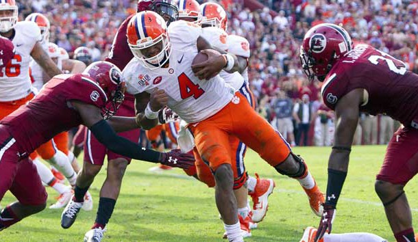 Nov 28, 2015; Columbia, SC, USA;  Clemson Tigers quarterback Deshaun Watson (4) carries for a touchdown during the second half against the South Carolina Gamecocks at Williams-Brice Stadium. Mandatory Credit: Joshua S. Kelly-USA TODAY Sports