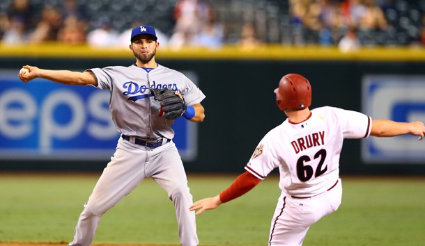 Jose Peraza (throwing) is on the move again. Mark J. Rebilas-USA TODAY Sports