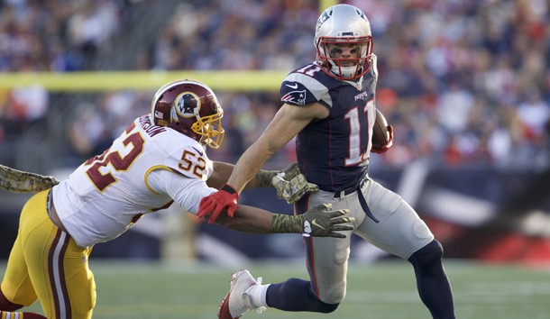 Nov 8, 2015; Foxborough, MA, USA; New England Patriots wide receiver Julian Edelman (11) runs the ball against Washington Redskins inside linebacker Keenan Robinson (52) in the second half at Gillette Stadium. The Patriots defeated the Redskins 27-10. Mandatory Credit: David Butler II-USA TODAY Sports