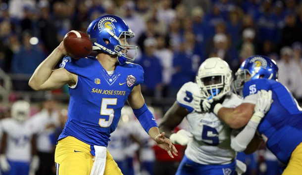 Dec 19, 2015; Orlando, FL, USA; San Jose State Spartans quarterback Kenny Potter (5) throws the ball against the Georgia State Panthers during the second quarter in the 2015 Cure Bowl at Citrus Bowl Stadium. Mandatory Credit: Kim Klement-USA TODAY Sports