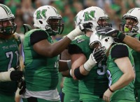 Solid D, Smith's FGs lead Marshall over UConn