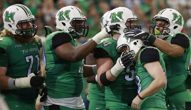 Dec 26, 2015; St. Petersburg, FL, USA; Marshall Thundering Herd place kicker Nick Smith (48) is congratulated by teammates as he made a field goal against the Connecticut Huskies  during the fourth quarter at Tropicana Field. Marshall Thundering Herd defeated the Connecticut Huskies 16-10. Mandatory Credit: Kim Klement-USA TODAY Sports