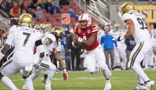 Dec 26, 2015; Santa Clara, CA, USA; Nebraska Cornhuskers quarterback Tommy Armstrong Jr. (4) runs the ball against the UCLA Bruins in the 2nd quarter at Levi's Stadium. Mandatory Credit: Neville E. Guard-USA TODAY Sports