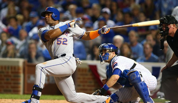 Yoenis Cespedes (52) hits an RBI single in the seventh inning against the Chicago Cubs in game three of the NLCS at Wrigley Field. Photo Credit: Jerry Lai-USA TODAY Sports
